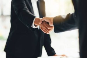 Shake hands stake investing