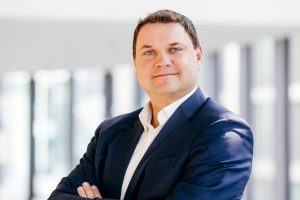 Jakob Becker, Leiter Kaufmännisches Management bei GRR GARBE Retail, Porträtfoto